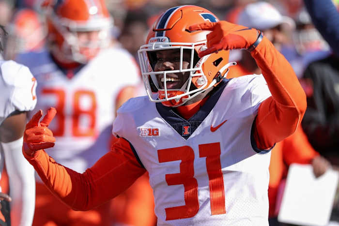 Nov 6, 2021; Minneapolis, Minnesota, USA; Illinois Fighting Illini defensive back Devon Witherspoon (31) celebrates a win against the Minnesota Golden Gophers in the fourth quarter at Huntington Bank Stadium. Mandatory Credit: Matt Krohn-USA TODAY Sports